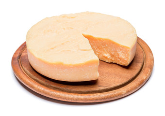 Whole round Head and pieces of parmesan or parmigiano