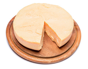 Whole round Head and pieces of parmesan or parmigiano