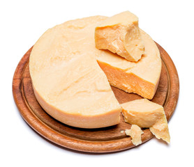 Whole round Head and pieces of parmesan or parmigiano