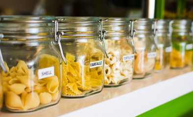 Various pasta selection in labeled jars