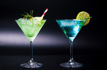 Colorful summer cocktails on black background