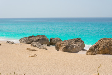 Megali Petra (big rock) beach in Lefkada ionian island in Greece. Endless beach with crystal clear turquoise sea waters 