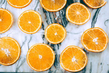 orange slices on white marble