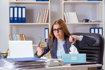 Businesswoman employee sick in the office