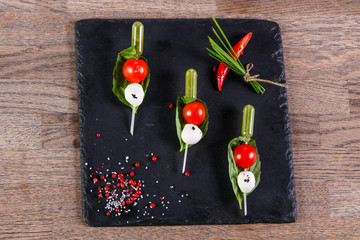 Canape caprese with oil