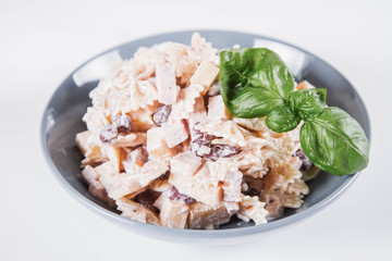 Pasta salad with cheese, ham, kidney beans and mayonnaise