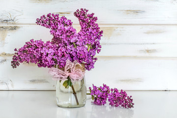 Bouquet of Purple Lilac  on a  Wooden Background.Spring Background