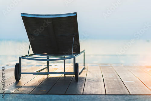 Summer Vacation Concept With Outdoor Wooden Bench On Terrace