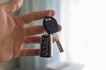 Car keys in hand, on the street