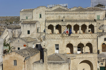 Fototapeta premium Historic building in Matera with the text of Matera 2019, capital of culture