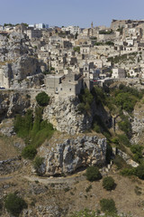 Fototapeta premium St. Peter caveoso church on Matera ravine, and city cityscape