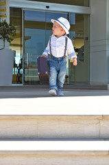 Young traveler with a suitcase