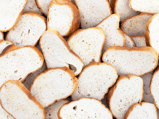 Fresh sliced white bread background. Food art, bakery and grocery concept