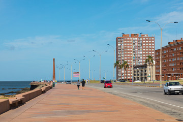Fototapeta premium Residential buildings at boulevard in Montevideo, Uruguay. Montevideo is the capital and the largest city of Uruguay.