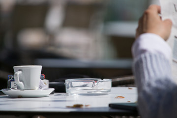 Business man reading a newspaper.