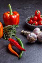 vegetable arrangement on dark surface