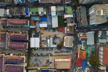 Obraz premium City building with road aerial view in sunset