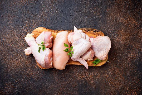 Raw chicken meat fillet, thigh, wings and legs