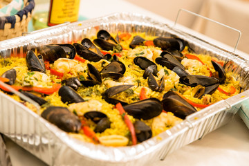 paella rice on tray with blurry background