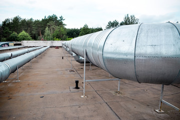 ventilation ducts on the roof of the building