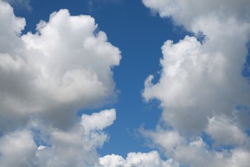 Fluffy Billowy Cumulus Clouds in the Blue Summer Sky in Florida