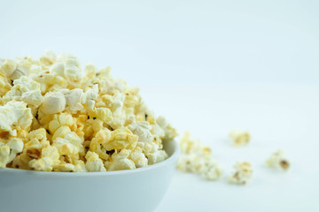 Popcorn bowl on a white background, Activity for holiday.