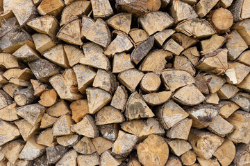 Pile of wood logs ready for winter