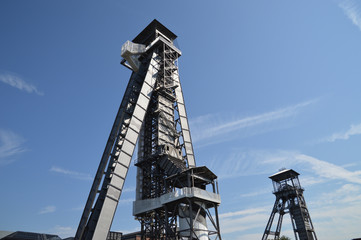 Fototapeta na wymiar two watch towers against a blue sky