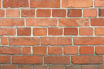 Old red brickwork with different defects