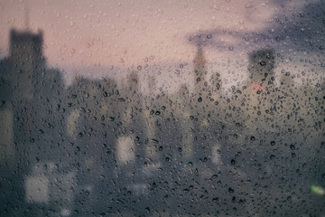 View on Manhattan midtown through the window with rain drops. New York City