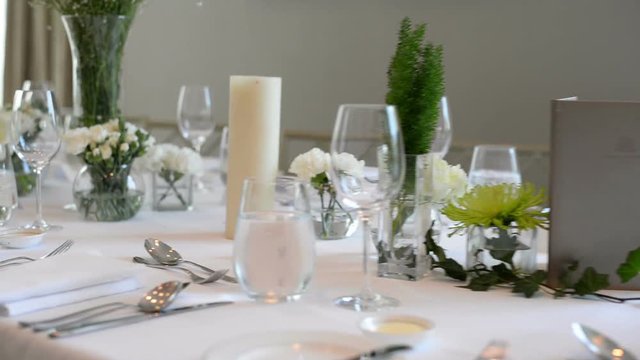 Table setting at a luxury wedding and beautiful flowers on the table