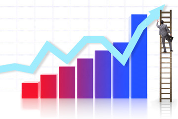 Businessman climbing towards growth in statistics