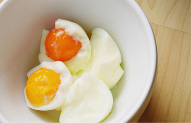 boiled eggs without  shell in bowl.
Egg keep you feeling full much longer than cereal or toast.