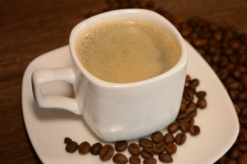a cup of coffee on a saucer