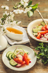 Vegetable salad from organic vegetables - healthy food (fresh vegetable set).  Food background