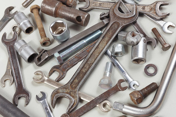 New and rusty metal tool and parts for car repair close up