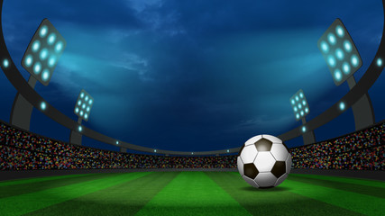 Night view at the football stadium with the ball