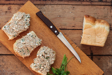 pate from fish on bread - fish appetizer (salad with bread) - Tasty food.  Food background