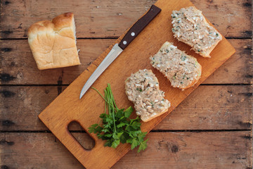 pate from fish on bread - fish appetizer (salad with bread) - Tasty food.  Food background
