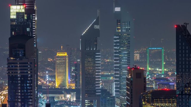 Commercial business district in a summer night timelapse. Dubai, UAE.
