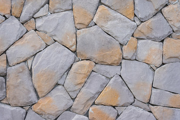 Stone rock pattern on wall, background.