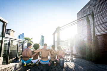 Friends partying on a rooftop