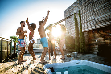 Friends partying on a rooftop