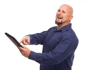 Man on digital tablet pointing and smiling.