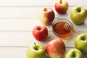 Seasonal harvest background with apples and honey