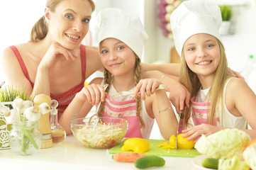 Mom and daughter cook 