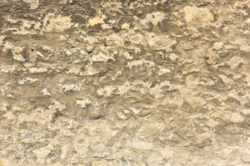 Old stone wall.Repair works.