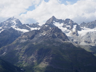Picturesque panorama of alpine mountains range landscape in swiss Alps at SWITZERLAND