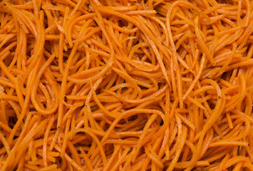 Carrot salad with spices. Korean Carrots, background