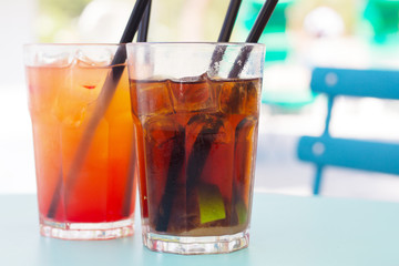 Cuba Libre and Tequila Sunrise cocktails